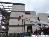 Erecting the stone panels at the East Elevation UCIA Roof 1.jpg